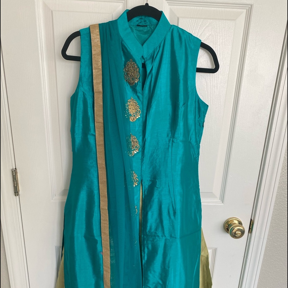 Brand new Gold and turquoise lehnga set. With long shirt